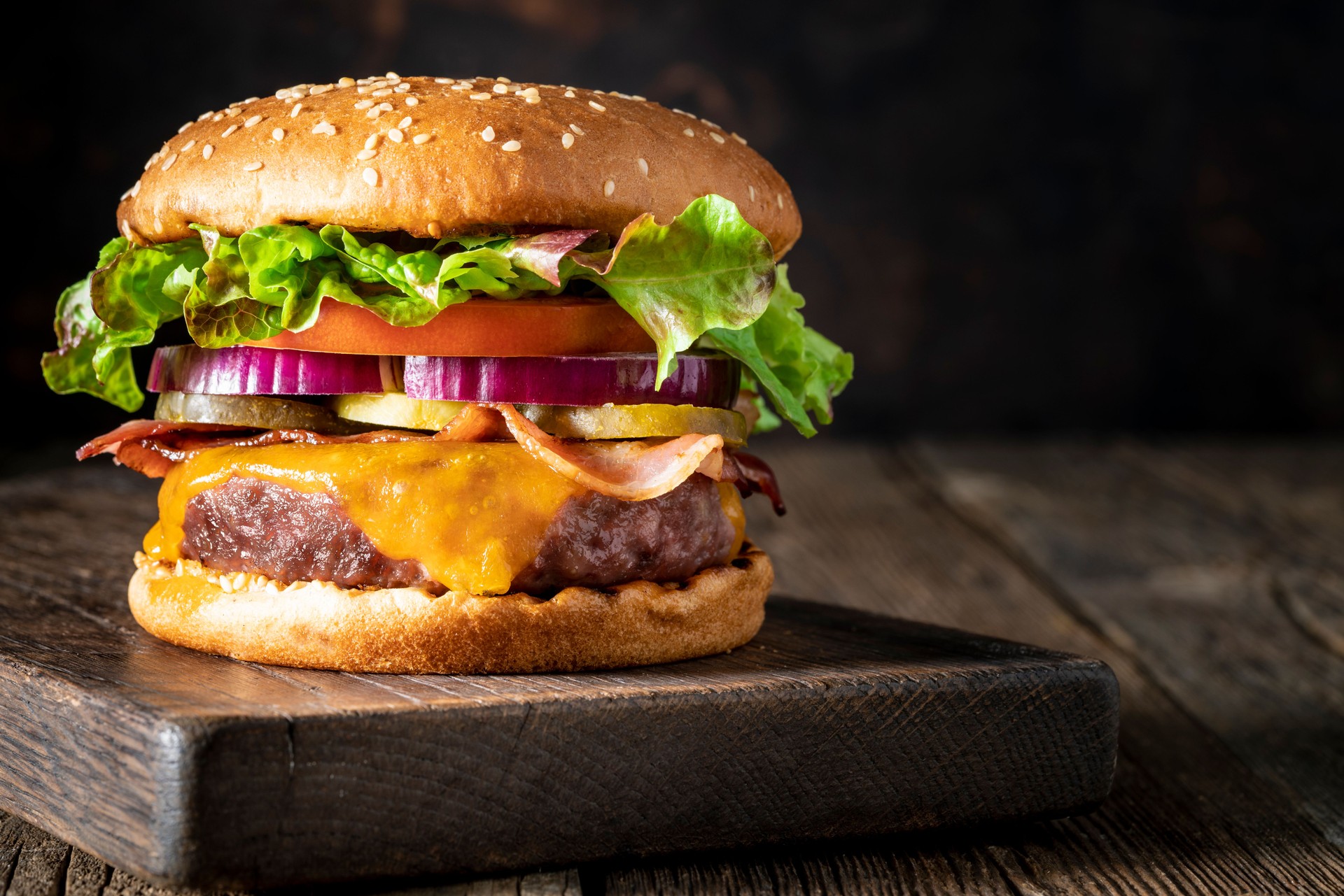 Cheeseburger Burger Patty classic on rustic board of wood