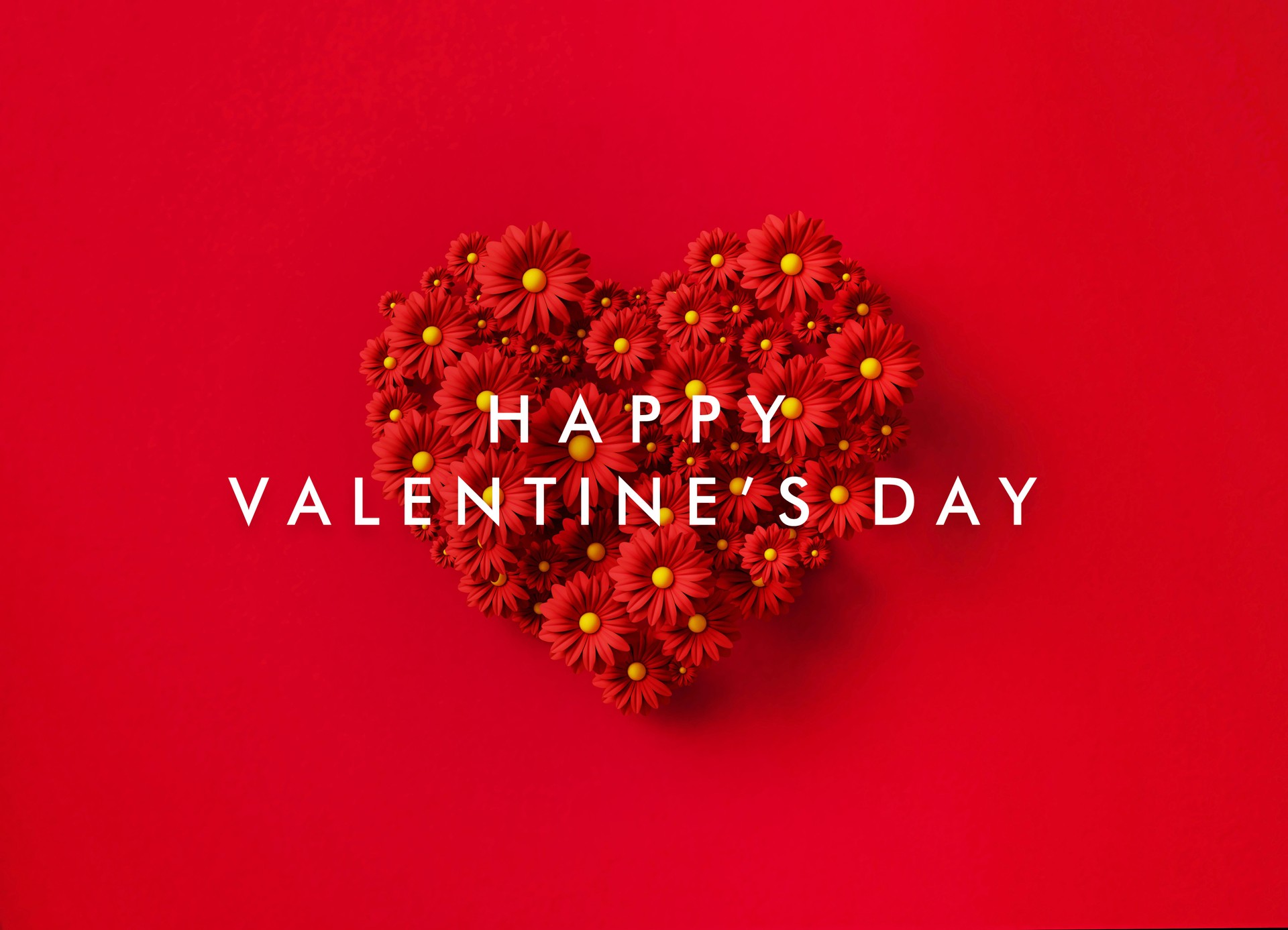 Valentine's Day Concept - Happy Valentine's Day Message Over A Heart Shaped By Red Daisies Over Red Background